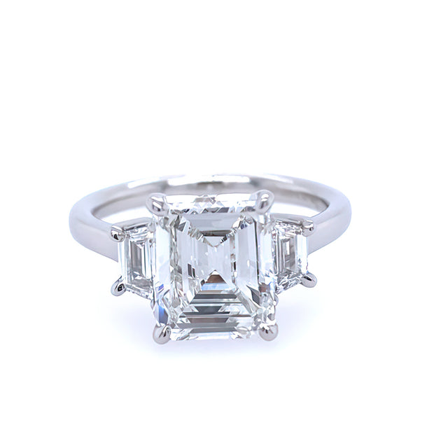 Platinum and Diamond Emerald Cut Diamond Ring with Trapezpoids