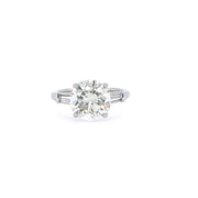 Platinum Round Brilliant Diamond Ring with Tapered Baguette Side Stones