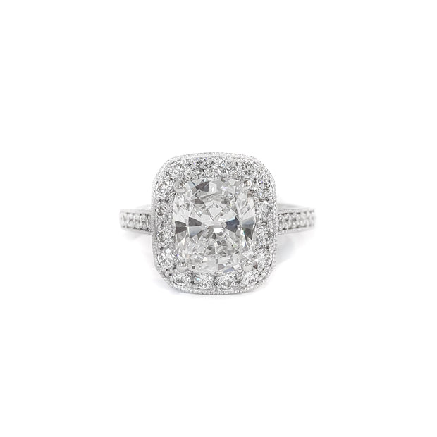 Platinum Cushion Cut Diamond Ring with Bead Set Diamond Halo