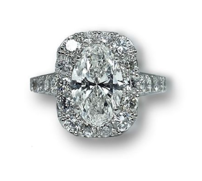 Platinum Oval Diamond Ring with Round Diamond Halo