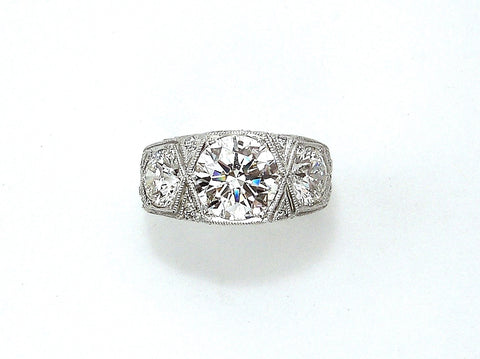 Platinum Art Deco Three Stone Round Diamond Ring