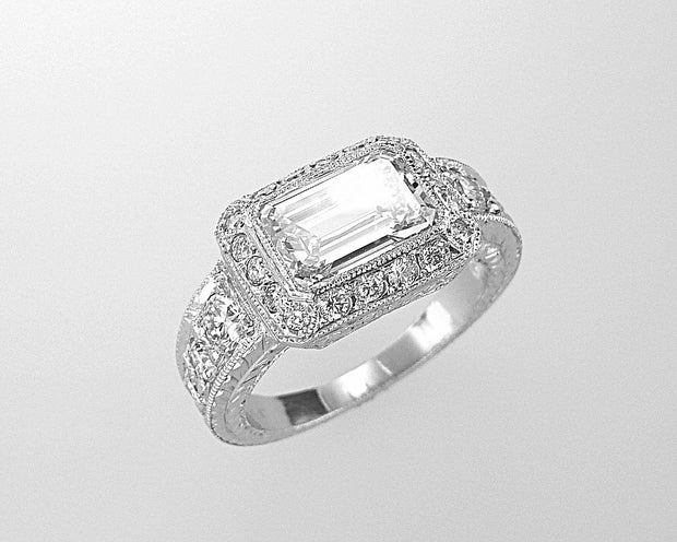 Platinum Emerald Cut Diamond Ring with Halo
