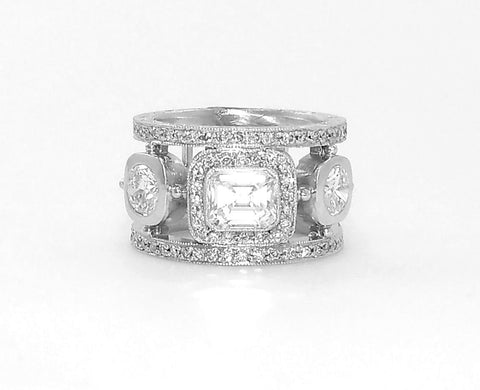 Platinum Emerald and Round Cut Diamond Ring