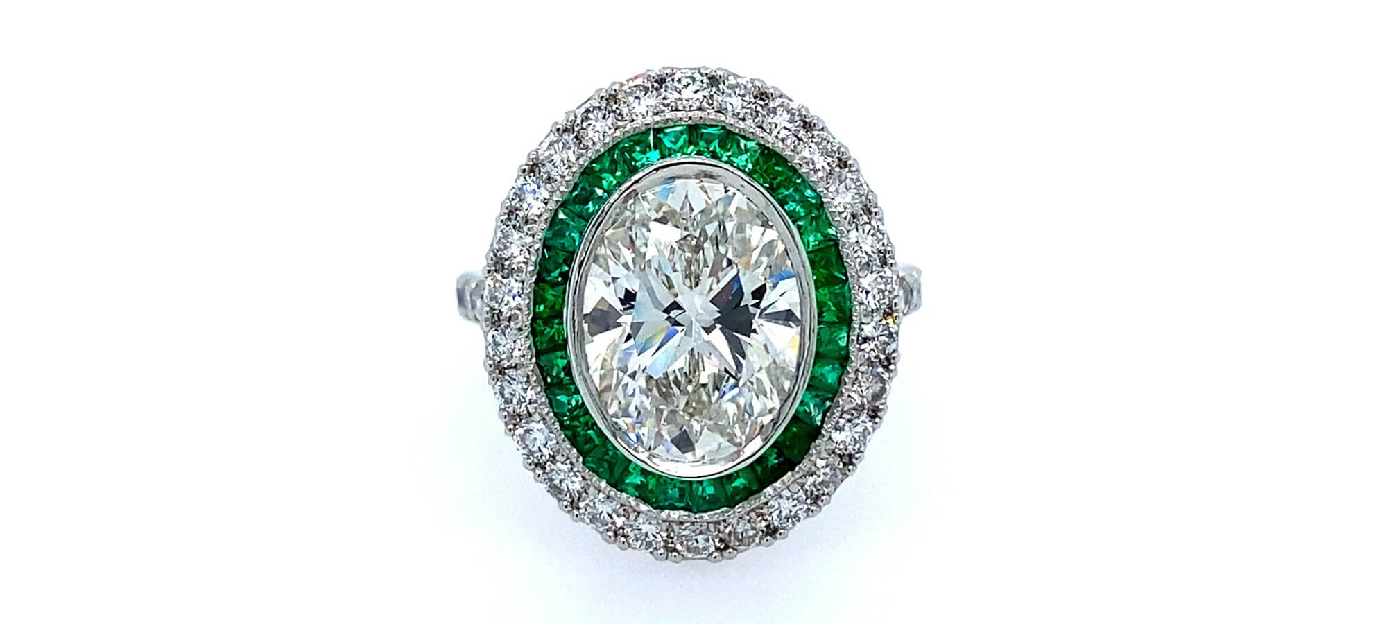 Custom Diamond and Emerald Ring