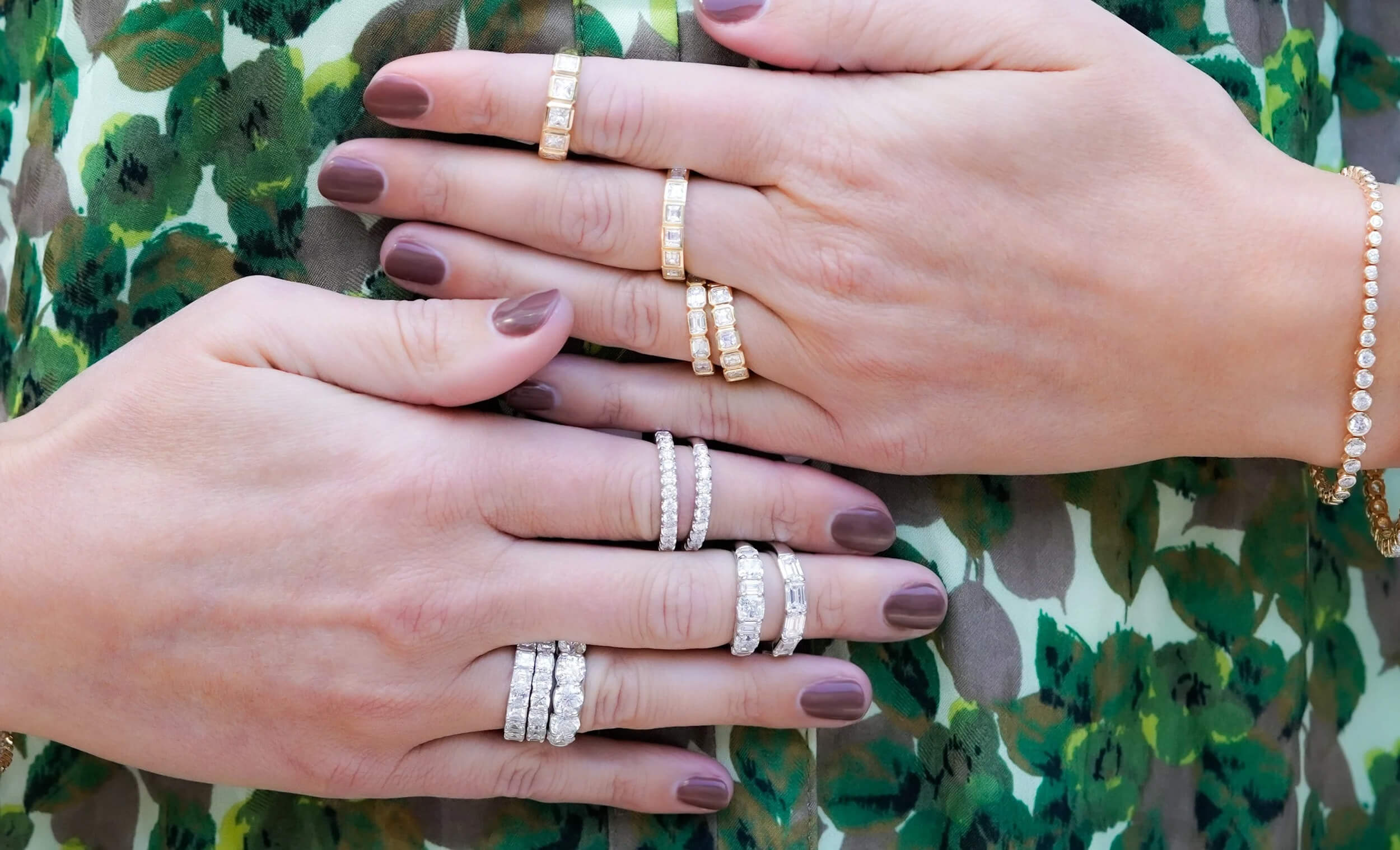 woman wearing multiple diamond band rings offered by Laura Pearce Ltd.