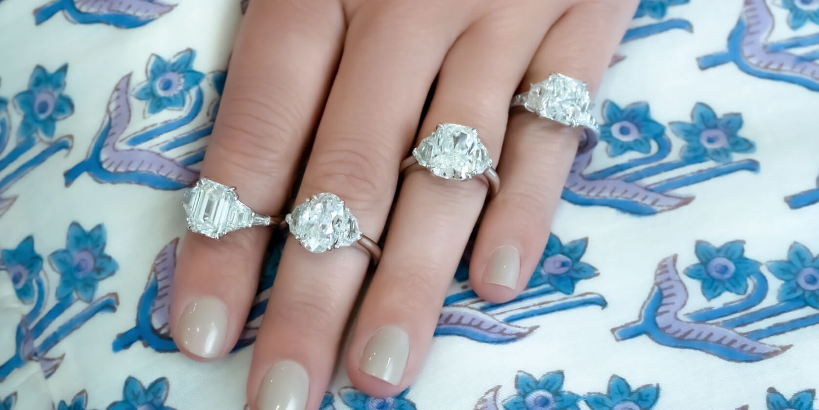woman wearing custom designed engagement rings