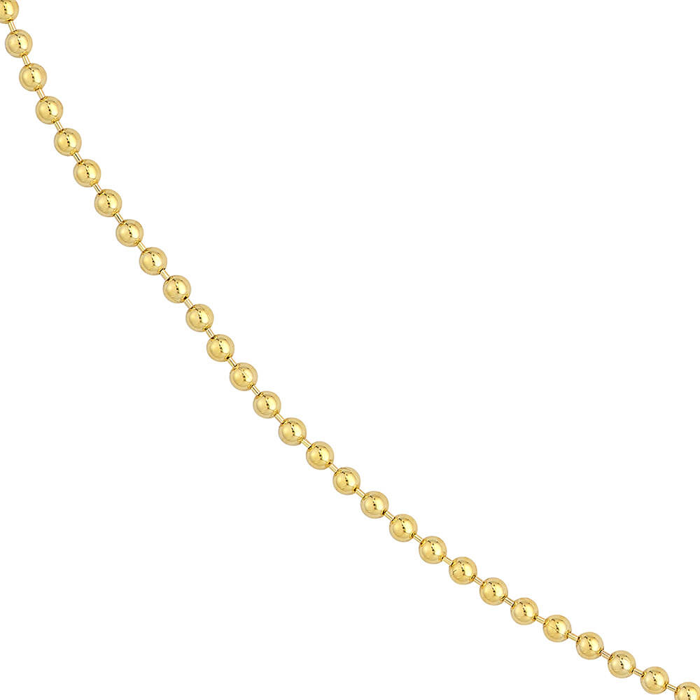 A close-up of a 14K yellow gold beaded chain necklace strand running diagonally from the top left to the bottom right on a plain white background.