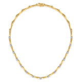 A 14K yellow gold tennis necklace featuring small round-cut diamonds set along the chain, displayed on a clean white background.