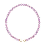 Necklace with pink Kunzite beads on a white background