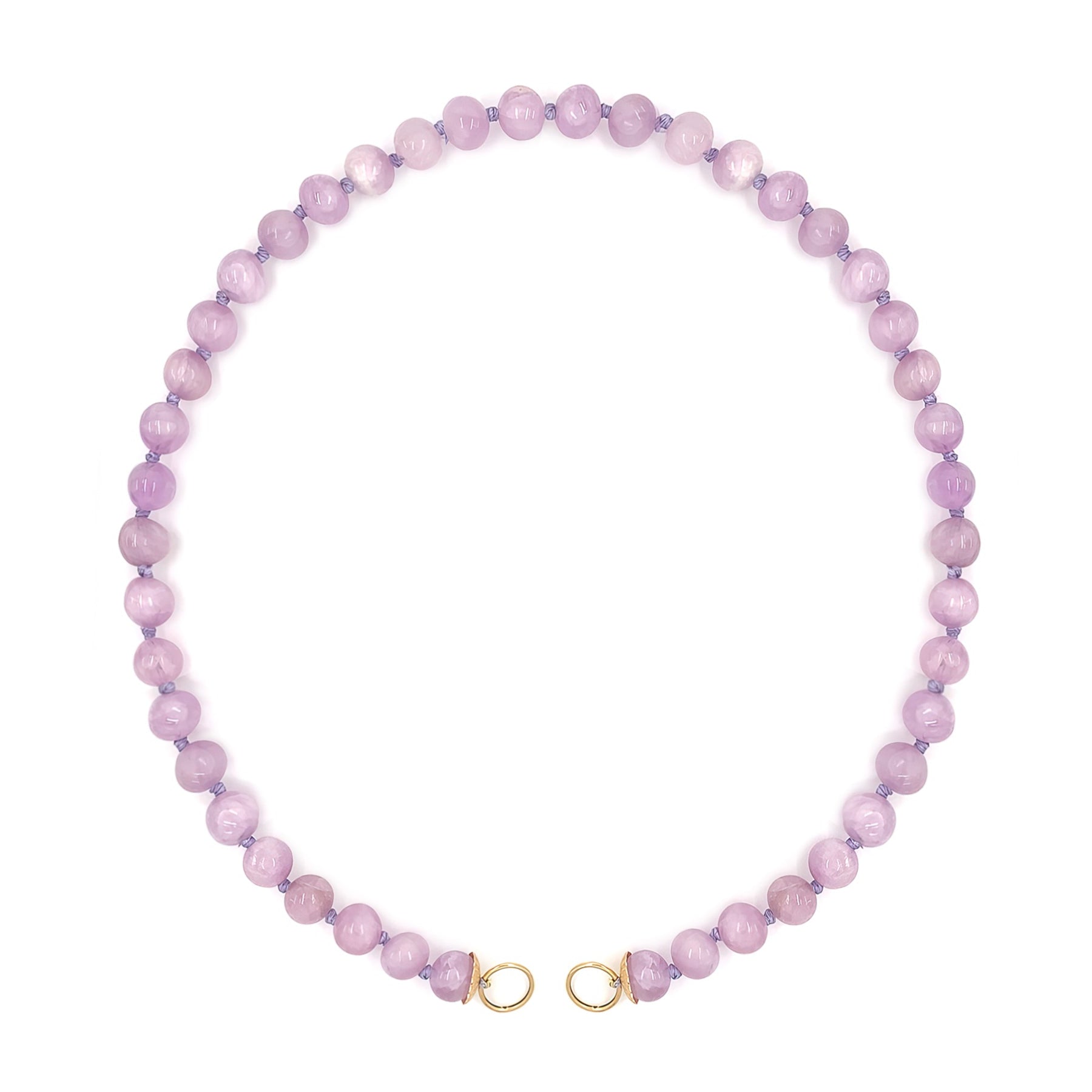 Necklace with pink Kunzite beads on a white background