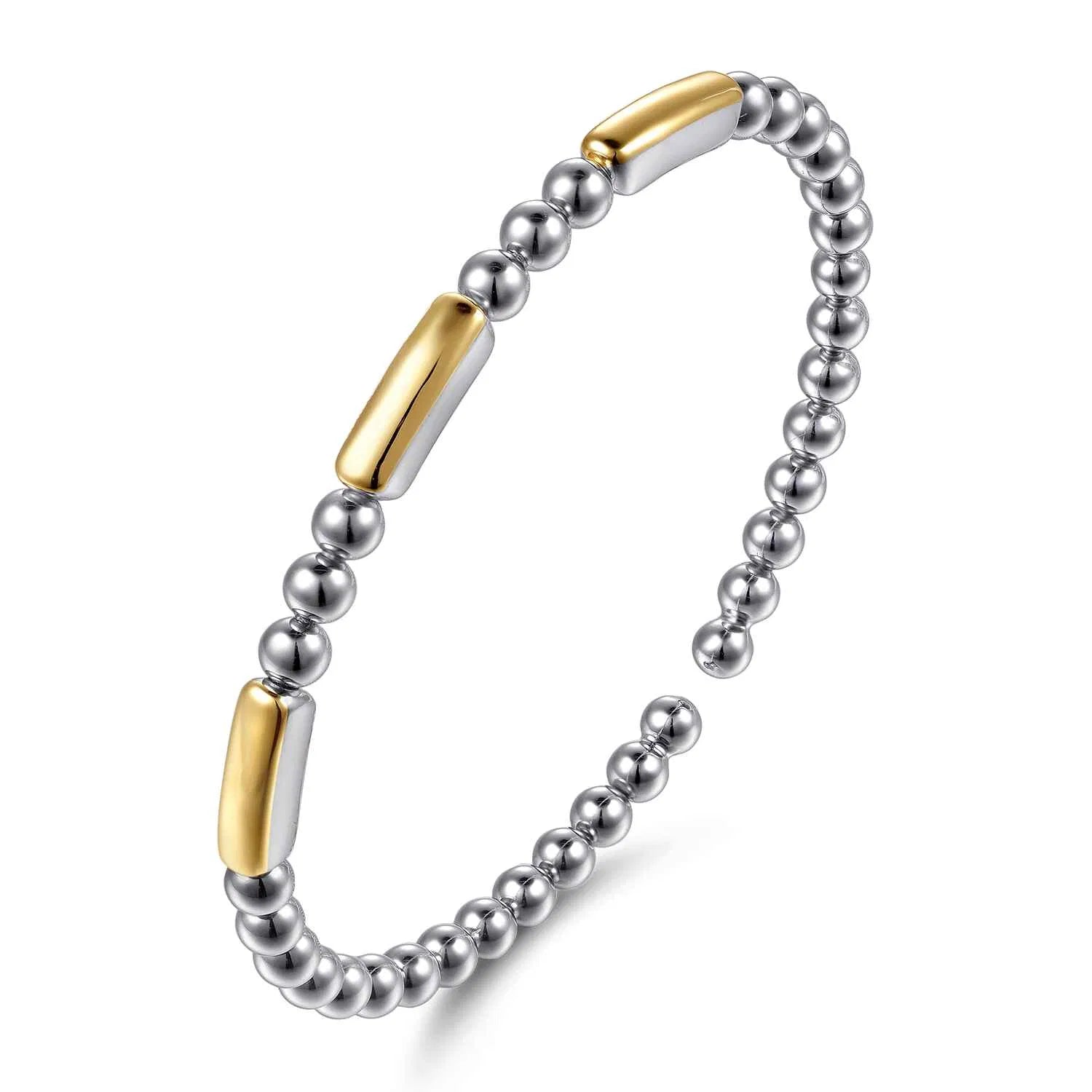 Bracelet with sterling silver beads and 14k gold bars on a white background