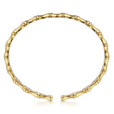 A 14K gold open cuff bracelet designed to look like a segmented bamboo stalk, shown on a clean white background.