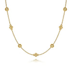 14K Gold necklace with spherical beads on a white background
