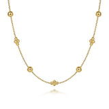 14K Gold necklace with spherical beads on a white background