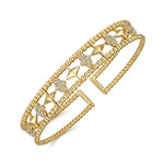 14K Gold bracelet with geometric designs and diamonds on a white background