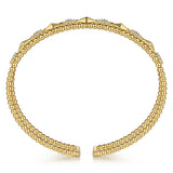 14K Gold bracelet with geometric designs and diamonds on a white background