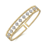 14K yellow gold bujukan diamond cuff bangle designed by Gabriel & Co