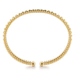 A 14K gold beaded cuff bracelet with a tapered, pyramid-like pattern and a split clasp design at the ends, shown on a clean white background.