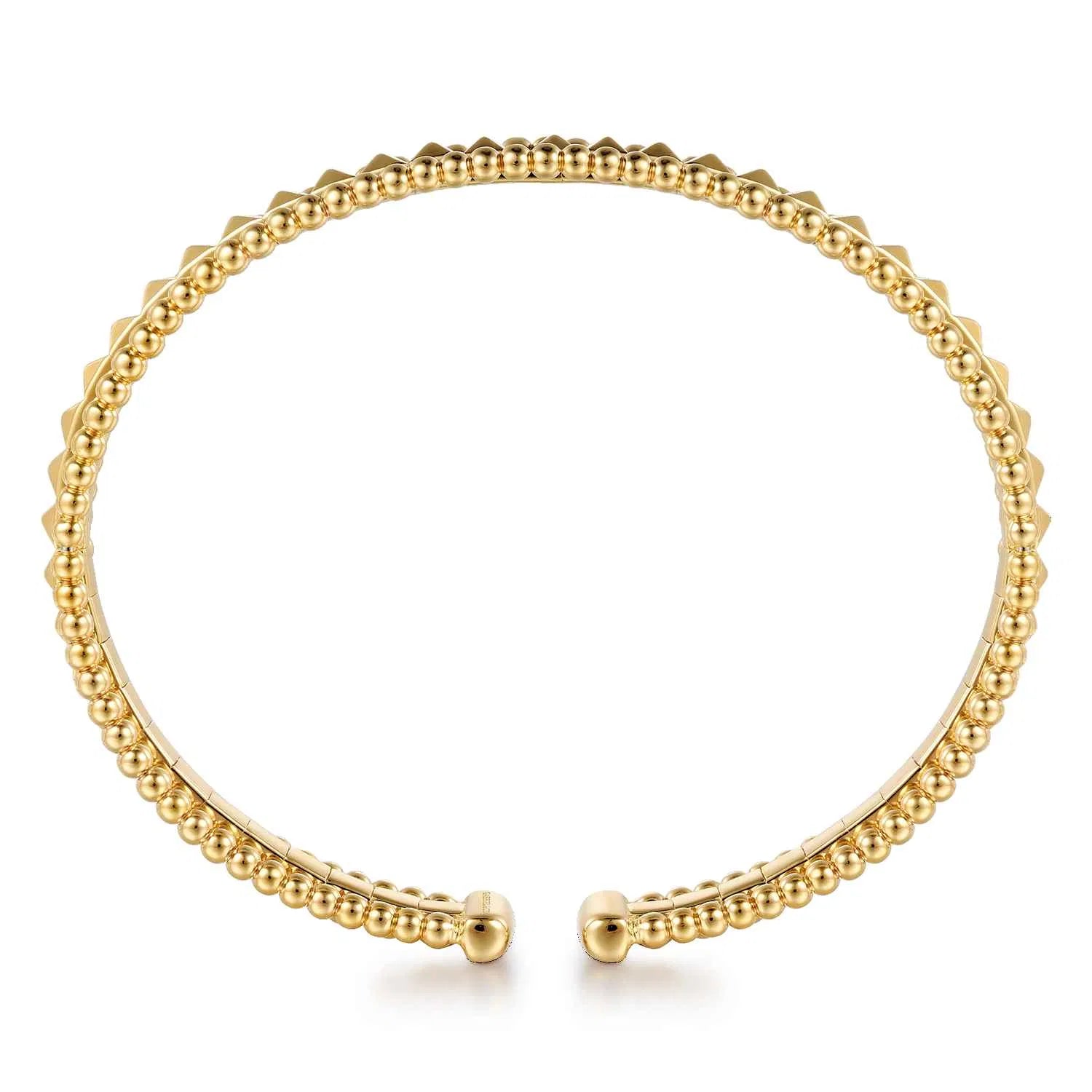 A 14K gold beaded cuff bracelet with a tapered, pyramid-like pattern and a split clasp design at the ends, shown on a clean white background.
