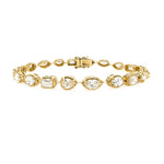 14K Gold bracelet with 6 Carat diamond stones on a white background