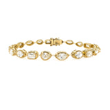 14K Gold bracelet with 6 Carat diamond stones on a white background