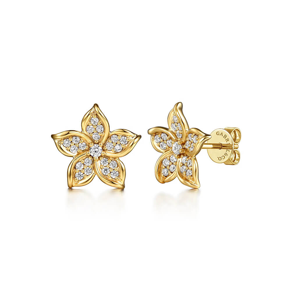 14K Yellow Gold flower-shaped earrings with diamond accents on a white background