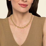 yellow gold graduated bead necklace on model neck