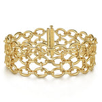 A 14K yellow gold hollow link chain bracelet designed by Gabriel & Co