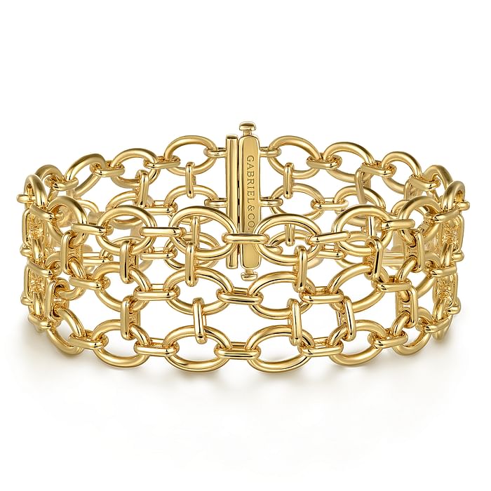 A 14K yellow gold hollow link chain bracelet designed by Gabriel & Co