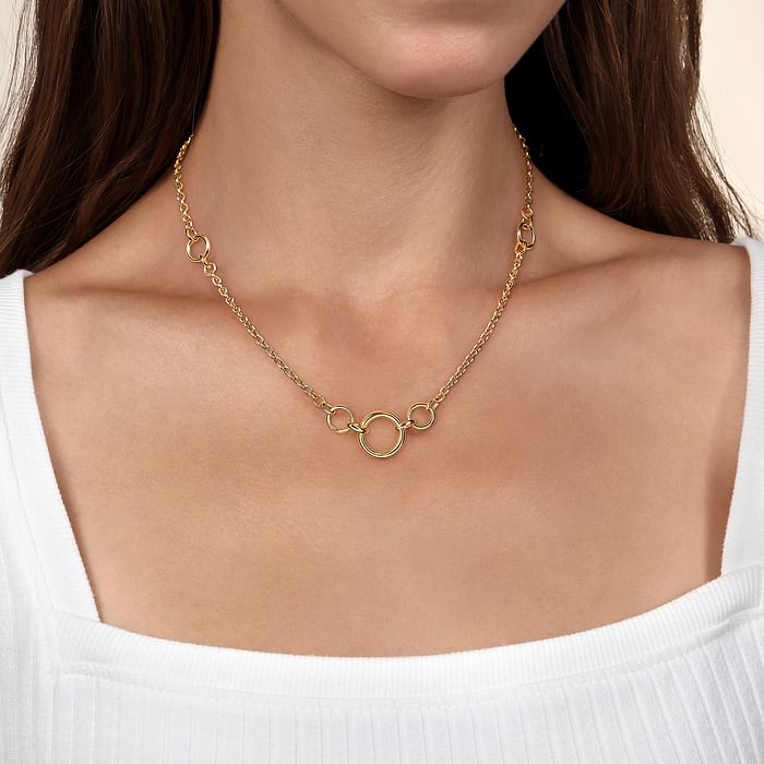 Woman wearing Gabriel & Co 14K yellow gold necklace