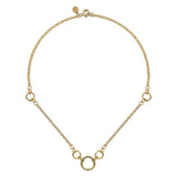 A 14K yellow gold tube link necklace with a length of 17 inches, featuring a series of connected circular elements.