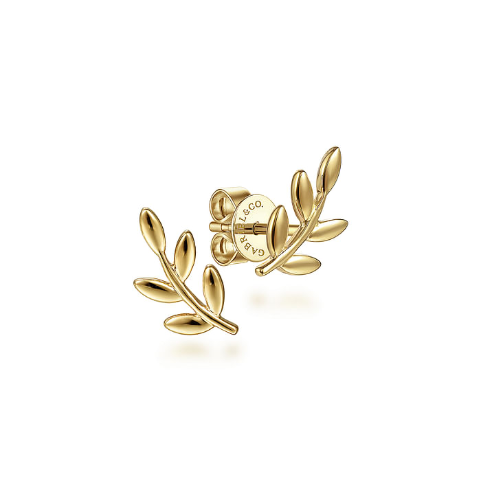 A pair of 14k yellow gold leaf-shaped stud earrings designed by Gabriel & Co.