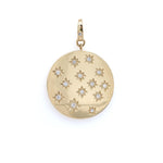 A 14K gold pendant with multiple star-shaped diamond designs