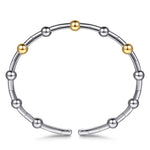 A sterling silver beaded bracelet with three polished 14K gold accent beads, displayed on a clean white background.