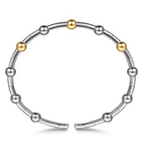 A sterling silver beaded bracelet with three polished 14K gold accent beads, displayed on a clean white background.