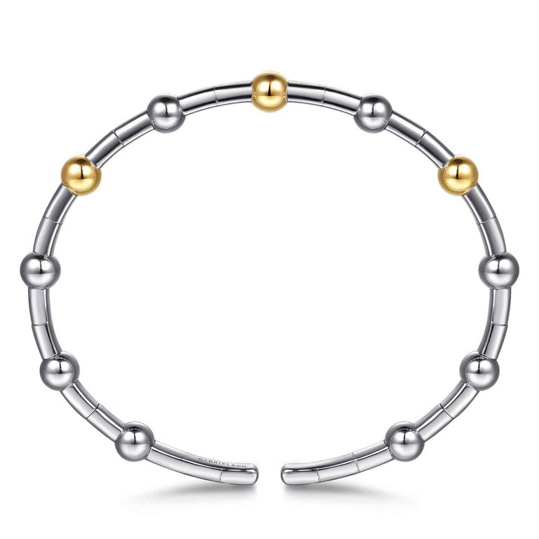 A sterling silver beaded bracelet with three polished 14K gold accent beads, displayed on a clean white background.