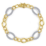 A 14K yellow gold chain bracelet with oval white gold links and pavé-set clear stones on alternating oval links, shown on a plain white background.