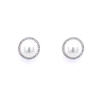 A pair of 14K white gold pearl and diamond earrings with circular designs