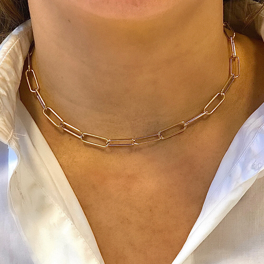 woman wearing a 14K yellow gold link necklace