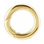 A 14K yellow gold hinged circle bail for pendants on necklaces 
