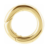 A 14K yellow gold hinged circle bail for pendants on necklaces 