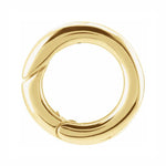 A polished 14K gold hinged circular bail to attach pendants to necklaces