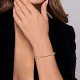 14K YG and Sterling Silver Three Station Bar Bujukan Bangle Bracelet on wrist
