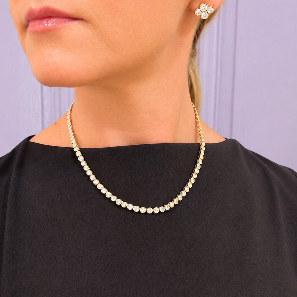 14K yellow gold bezel diamond tennis neckalace on model