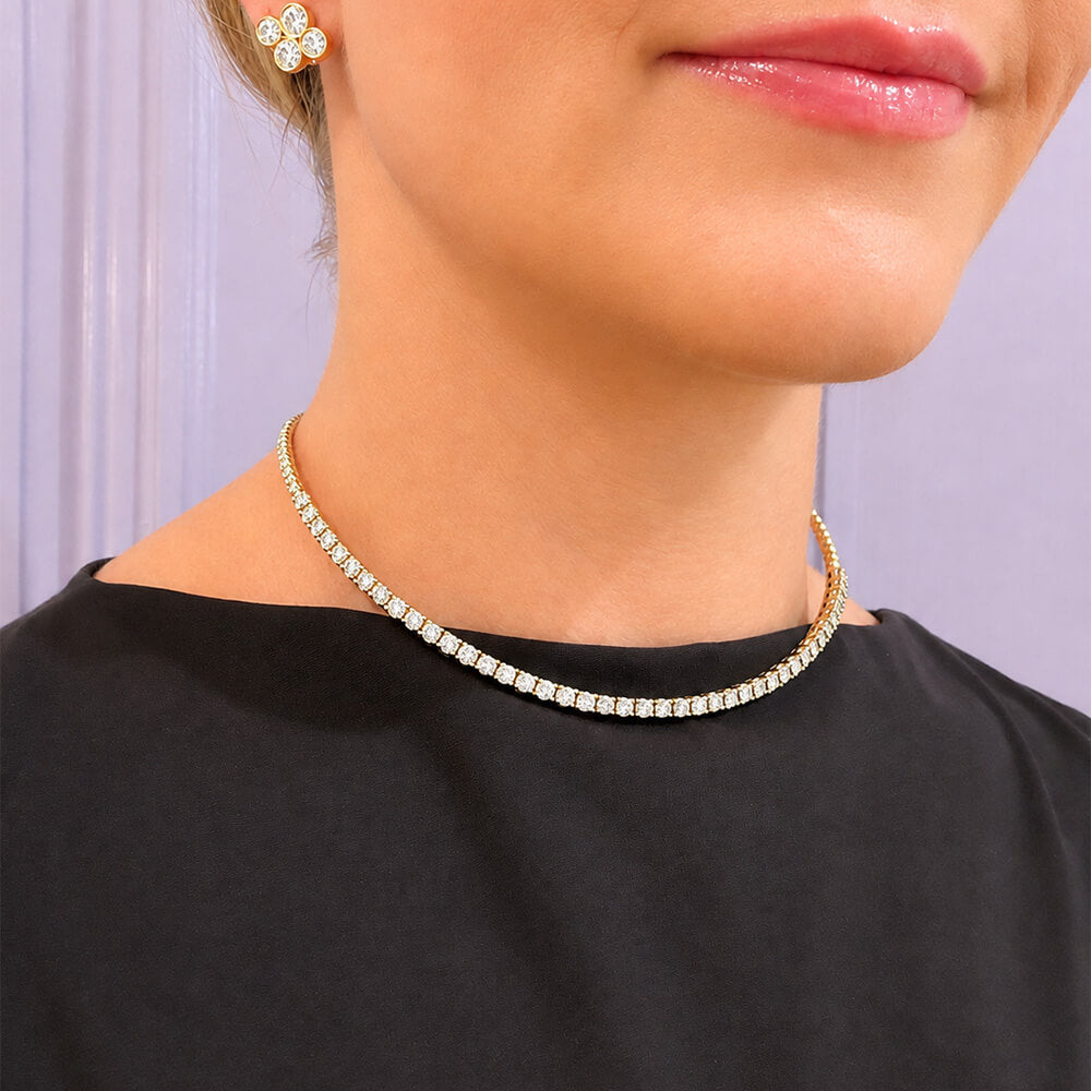 14K yellow gold prong set diamond choker necklace on model
