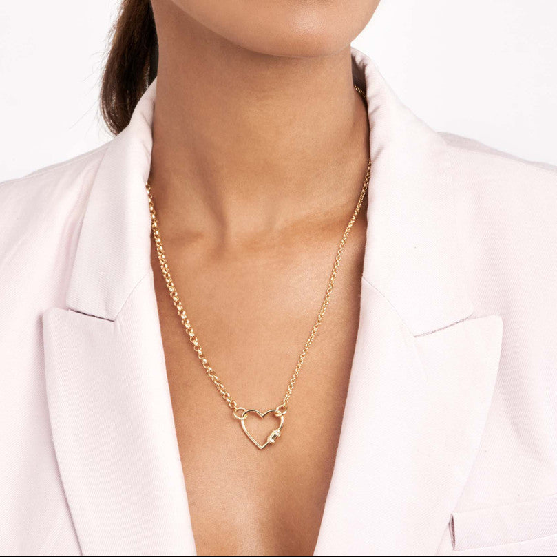 woman wearing 14K gold diamond barrel twist heart shaped necklace clasp