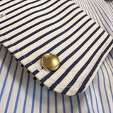 14K gold round button cufflinks on a shirt