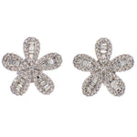 Flower-shaped diamond earrings on a white background