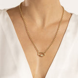 14K Gold necklace with a lock pendant on a white background