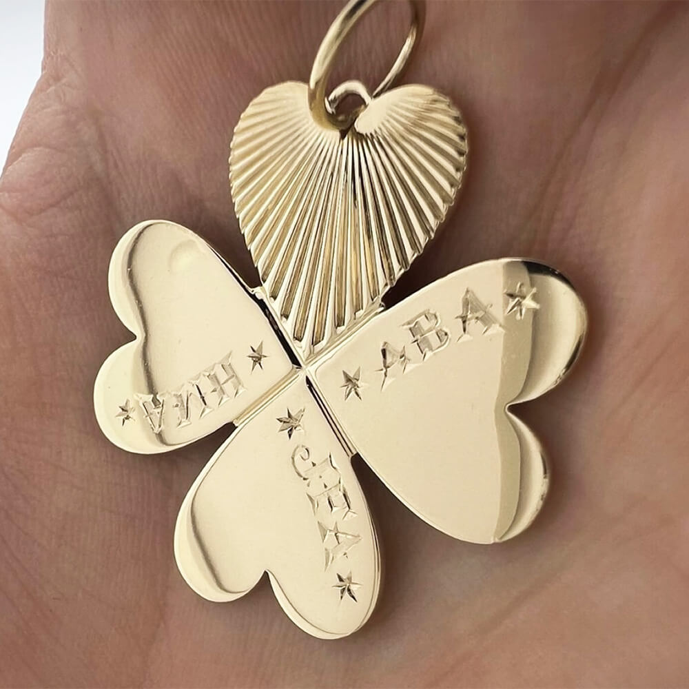14K yellow gold clover pendant engraved with names